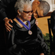 President Barack Obama kisses Maya Angelou after giving her the 2010 Medal of Freedom in the East Room of the White House Feb. 15, 2011.
Chip Somodevilla/Getty Images